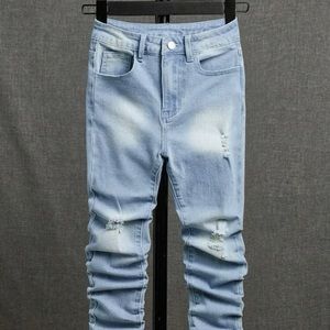 Fitted distressed blue Jeans